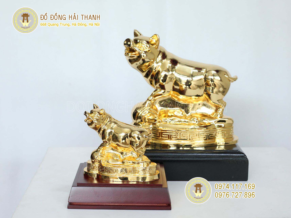 tượng heo mạ vàng